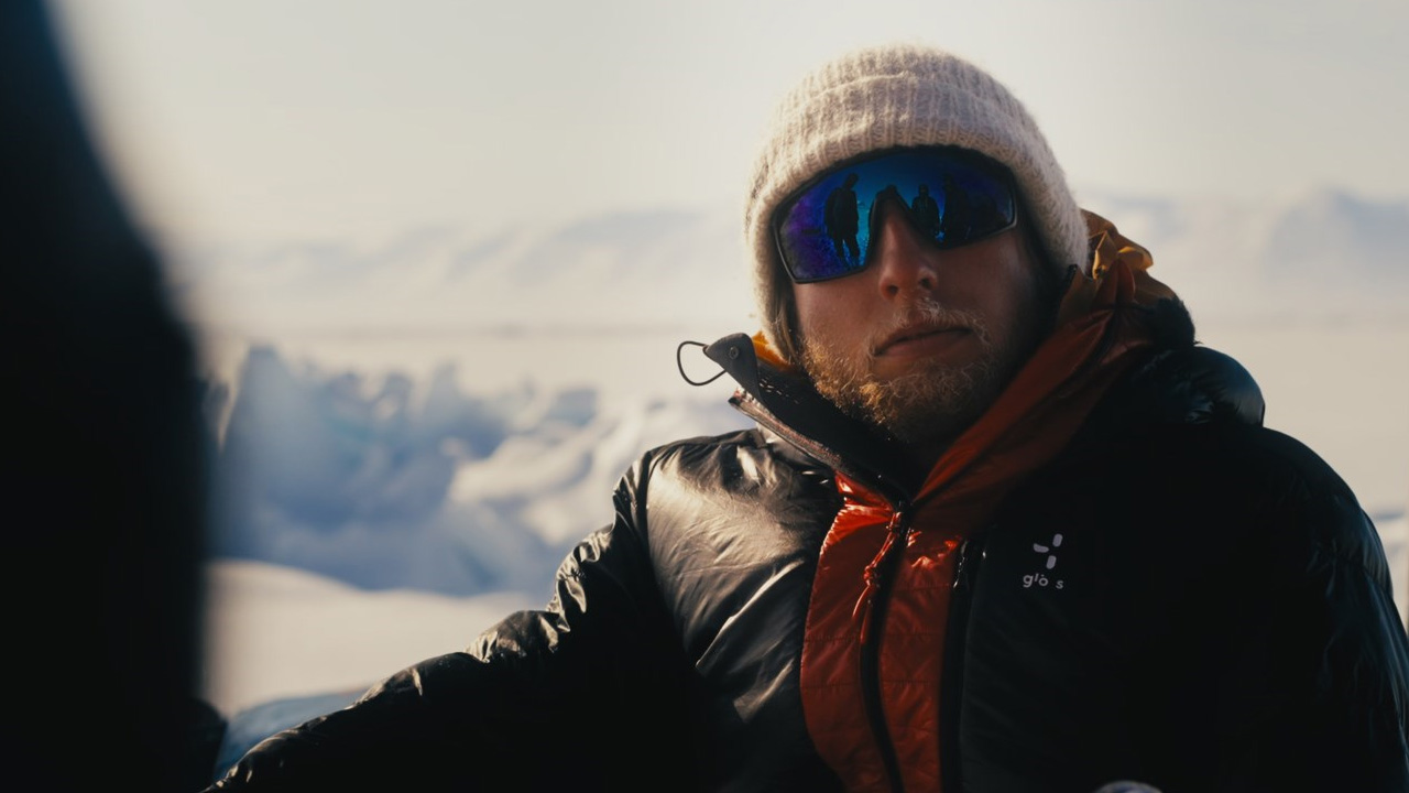 Man-sitting-in-snow.jpg Man-sitting-in-snow.jpg